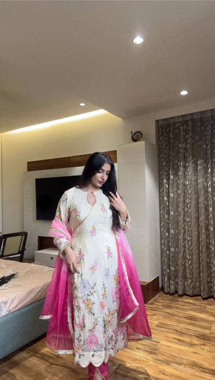 Graceful Floral Suit with Bright Pink Dupatta Embroidered Dress