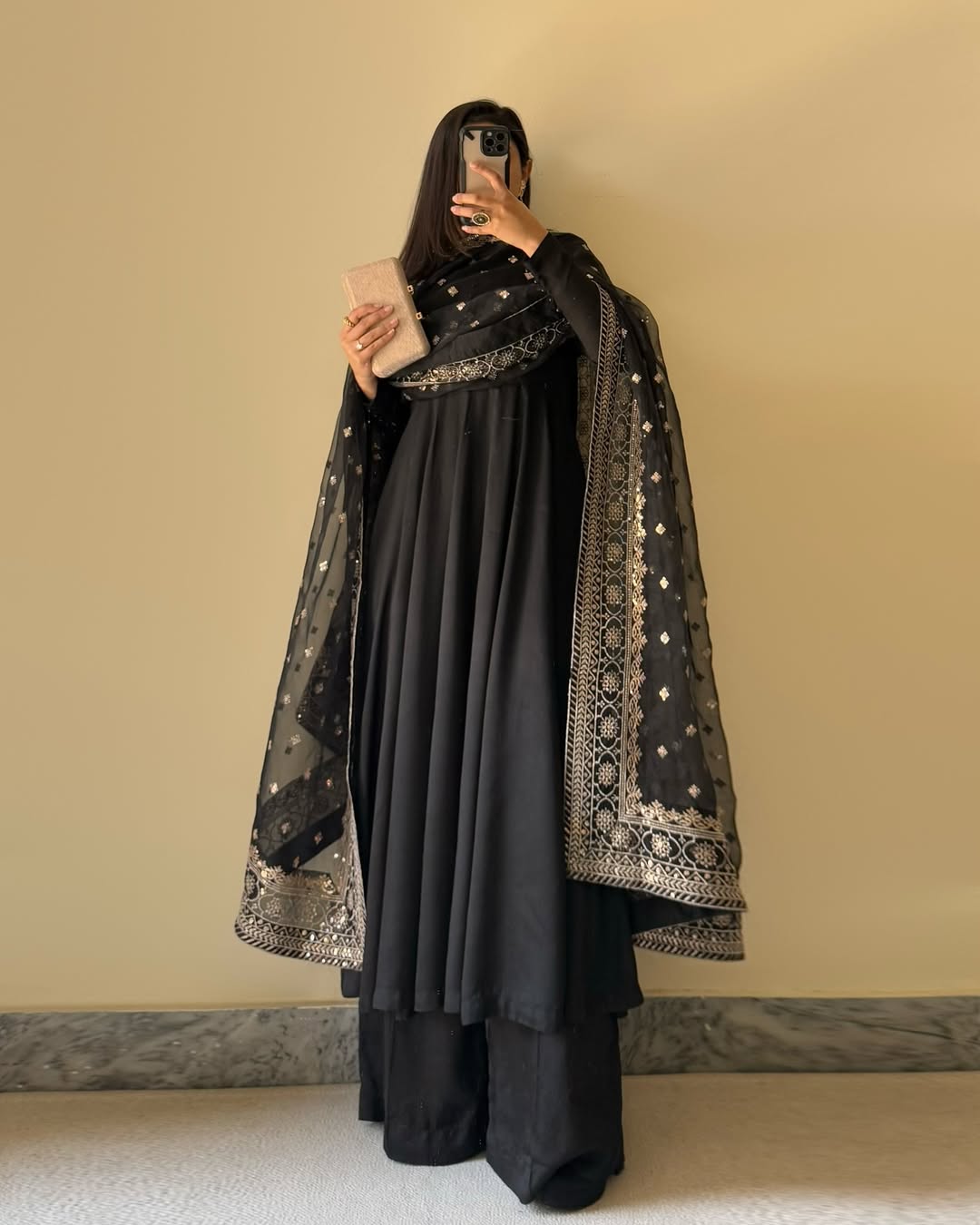 Front view of Black Floral Suit Set with embroidered Faux Georgette dupatta and matching palazzo.