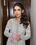  Front view of Western embroidered top with sequin palazzo and stylish koti.

