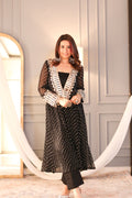 Model wearing black georgette Anarkali-style side cut kurti with embroidery work