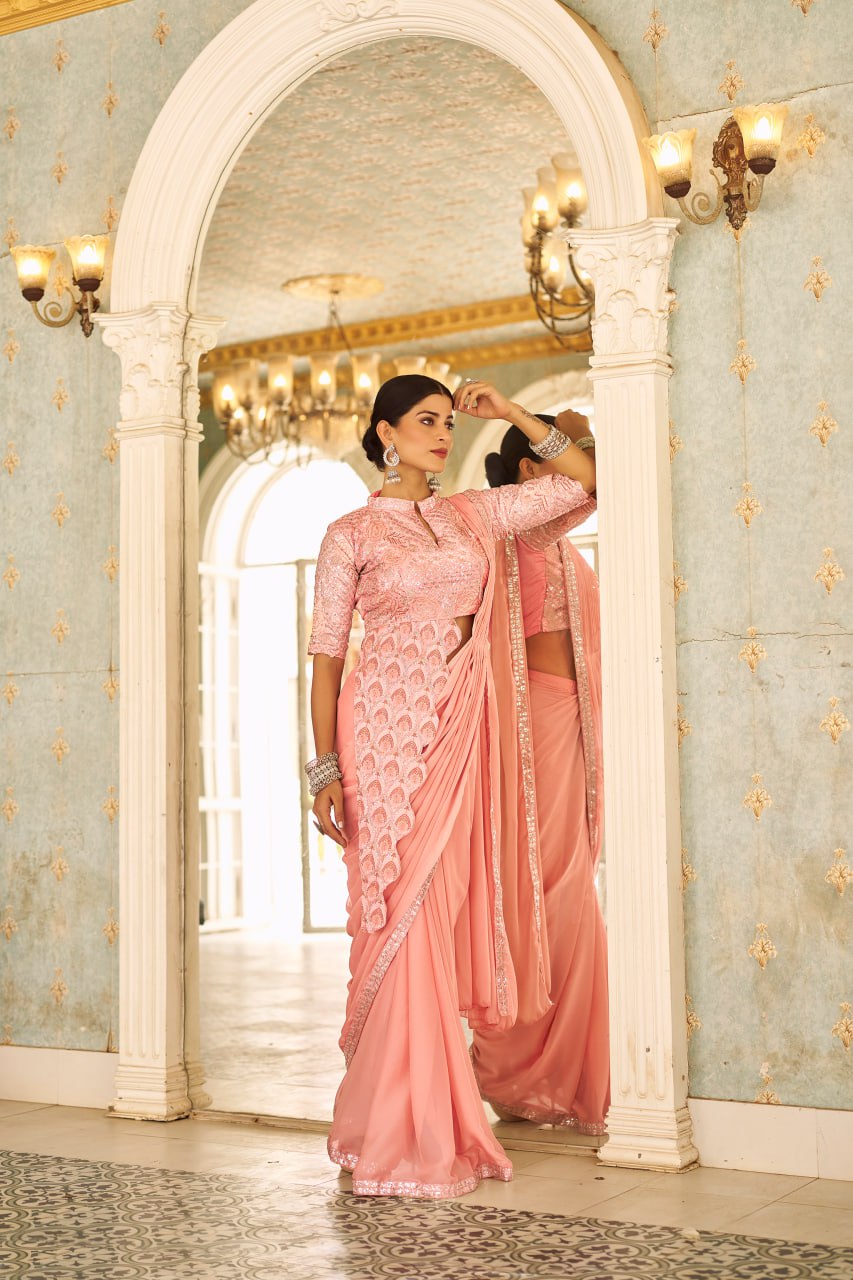 Model wearing Mallow Mauve Ready-to-Wear Saree with embroidered details

